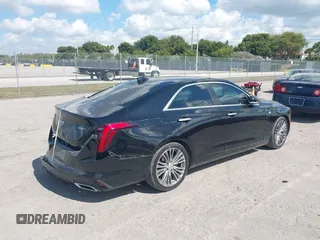 2021 Cadillac CT4 Premium Luxury with VIN 1G6DB5RK1M0132254, listed as a IAAI auction lot 41548569 with 61,862 mi miles and . Bid and sale history available at DreamBid. Image 4.