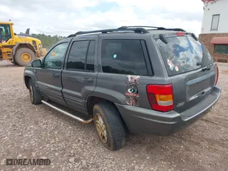 2004 Jeep Grand Cherokee Laredo with VIN 1J4GX48S14C176318, listed as a IAAI auction lot 41887810 with 1 mi miles. Bid and sale history available at carsss.com. Image 3.