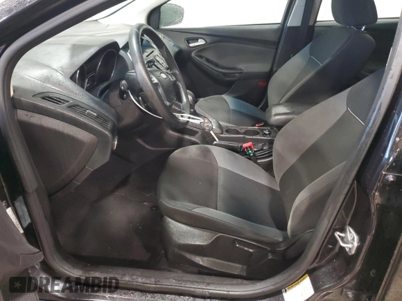 2012 Ford Focus SE z VIN 1FAHP3K24CL407570, wystawiony jako Copart lot #56002135 z przebiegiem 122 730 mil mil oraz Szkoda całkowita • Salvage title. Historia ofert i sprzedaży dostępna na DreamBid. Obrazek 7.