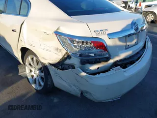 2013 Buick LaCrosse Touring with VIN 1G4GJ5E32DF162786, listed as a IAAI auction lot 41327452 with 221,117 mi miles and . Bid and sale history available at DreamBid. Image 6.