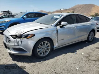 2017 Ford Fusion Hybrid SE with VIN 3FA6P0LU9HR306927, listed as a Copart auction lot 63943395 with 157,851 mi miles and Clean title. Bid and sale history available at DreamBid. Image 1.