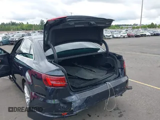 2018 Audi A4 Prestige z VIN WAUFNAF45JA019132, wystawiony jako IAAI lot #42239810 z przebiegiem 63 002 mil mil oraz . Historia ofert i sprzedaży dostępna na DreamBid. Obrazek 6.