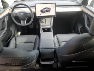 2023 Tesla Model Y Long Range with VIN 7SAYGDEE2PA024693, listed as a Copart auction lot 52595935 with 35,179 mi miles and Salvage Title. Bid and sale history available at DreamBid. Image 8.