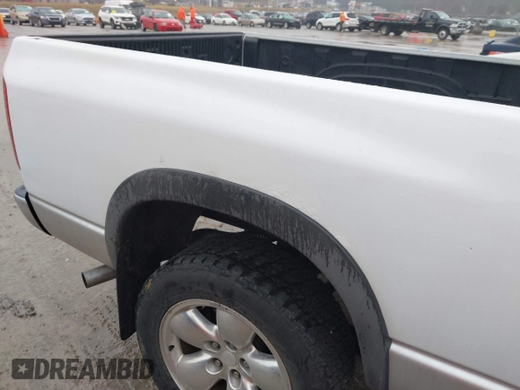 2004 Dodge 1500 SLT with VIN 1D7HU18N54S511832, listed as a IAAI auction lot 41495315 with 234,310 mi miles and . Bid and sale history available at carsss.com. Image 6.
