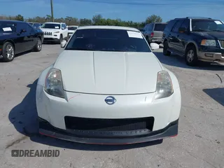 2004 Nissan 350Z Touring with VIN JN1AZ34E74T064156, listed as a IAAI auction lot 41498213 with 148,370 mi miles. Bid and sale history available at carsss.com. Image 12.