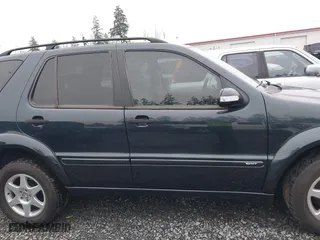 2002 Mercedes-Benz M-Class with VIN 4JGAB54E72A296354, listed as a IAAI auction lot 41277897 with 101,842 mi miles. Bid and sale history available at carsss.com. Image 13.