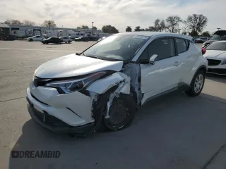 2019 Toyota C-HR XLE with VIN JTNKHMBX3K1036759, listed as a Copart auction lot 48520215 with 56,609 mi miles and Salvage Title. Bid and sale history available at carsss.com. Image 1.