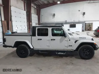 2021 Jeep Gladiator Texas Trail with VIN 1C6HJTAG3ML548261, listed as a IAAI auction lot 41791595 with 34,582 mi miles. Bid and sale history available at carsss.com. Image 13.