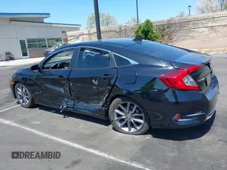 2019 Honda Civic EX z VIN 19XFC1F3XKE215534, wystawiony jako IAAI lot #42100714 z przebiegiem 31 808 mil mil oraz . Historia ofert i sprzedaży dostępna na DreamBid. Obrazek 14.