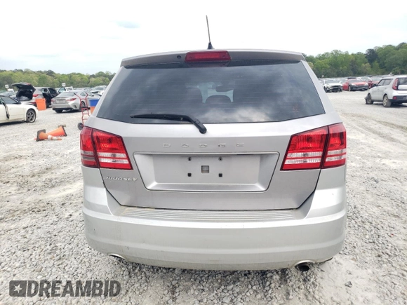 2015 Dodge Journey SE z VIN 3C4PDCAB5FT675083, wystawiony jako Copart lot #52680595 z przebiegiem 116 878 mil mil oraz Czysty tytuł • Clean title. Historia ofert i sprzedaży dostępna na DreamBid. Obrazek 6.