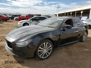 2016 Maserati Ghibli S with VIN ZAM57RSA8G1169744, listed as a Copart auction lot 68233953 with 73,376 mi miles. Bid and sale history available at carsss.com. Image 1.