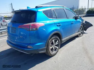 2018 Toyota RAV4 XLE with VIN JTMWFREV7JJ730968, listed as a IAAI auction lot 41778761 with 122,102 mi miles. Bid and sale history available at carsss.com. Image 4.