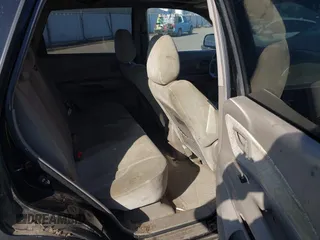 2005 Hyundai Tucson GLS with VIN KM8JN12D55U142254, listed as a IAAI auction lot 42150708 with 222,286 mi miles. Bid and sale history available at carsss.com. Image 8.