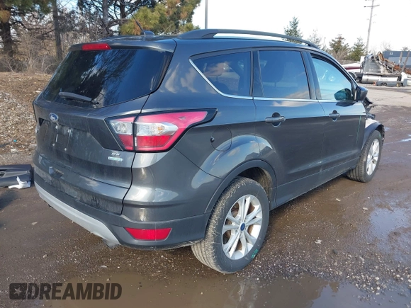 2018 Ford Escape SE with VIN 1FMCU0GD5JUC46932, listed as a IAAI auction lot 41749296 with 111,236 mi miles. Bid and sale history available at carsss.com. Image 4.