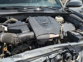 2020 Toyota Tacoma SR5 with VIN 3TMDZ5BN4LM084726, listed as a Copart auction lot 65901085 with 113,204 mi miles and Salvage title. Bid and sale history available at DreamBid. Image 14.