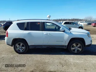 2016 Jeep Compass High Altitude Edition with VIN 1C4NJCEA8GD676091, listed as a IAAI auction lot 41447387 with 120,881 mi miles. Bid and sale history available at carsss.com. Image 13.
