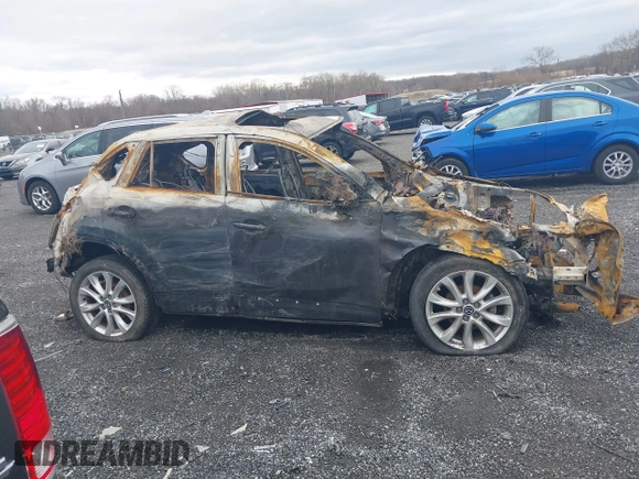 2014 Mazda CX-5 Grand Touring with VIN JM3KE4DY5E0321113, listed as a IAAI auction lot 41728237 with 20 mi miles. Bid and sale history available at carsss.com. Image 12.