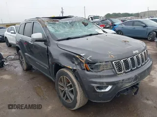 2017 Jeep Grand Cherokee Limited with VIN 1C4RJEBG0HC915453, listed as a IAAI auction lot 41461184 with 194,506 mi miles. Bid and sale history available at carsss.com. Image 1.