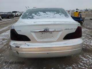 2001 Toyota Avalon XL z VIN 4T1BF28B01U138751, wystawiony jako Copart lot #44849165 z przebiegiem 225 082 mil mil oraz Tytuł czysty. Historia ofert i sprzedaży dostępna na DreamBid. Obrazek 6.
