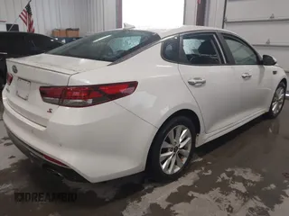 2018 Kia Optima LX z VIN 5XXGT4L31JG238006, wystawiony jako IAAI lot #41978646 z przebiegiem 84 672 mil mil oraz . Historia ofert i sprzedaży dostępna na DreamBid. Obrazek 4.