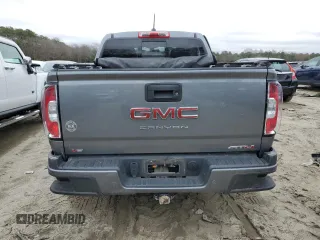 2022 GMC Canyon 4WD AT4 z VIN 1GTG6FENXN1274389, wystawiony jako Copart lot #85255404 z przebiegiem 42 843 mil mil oraz Szkoda całkowita • Salvage title. Historia ofert i sprzedaży dostępna na DreamBid. Obrazek 6.