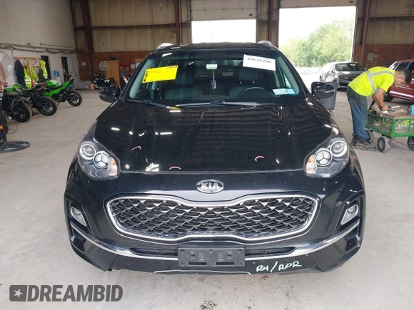 2021 Kia Sportage EX z VIN KNDPNCAC5M7886551, wystawiony jako IAAI lot #42645206 z przebiegiem 49 312 mil mil oraz . Historia ofert i sprzedaży dostępna na DreamBid. Obrazek 12.