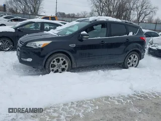 2016 Ford Escape Titanium with VIN 1FMCU9J96GUC08563, listed as a IAAI auction lot 41252475 with 120,404 mi miles. Bid and sale history available at carsss.com. Image 17.