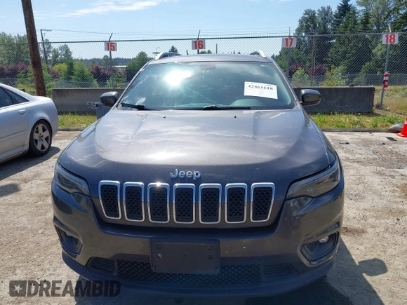 2019 Jeep Cherokee Latitude Plus z VIN 1C4PJMLNXKD195563, wystawiony jako IAAI lot #42461618 z przebiegiem 78 603 mil mil oraz . Historia ofert i sprzedaży dostępna na DreamBid. Obrazek 12.
