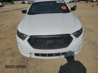 2015 Ford Police Interceptor with VIN 1FAHP2L80FG167962, listed as a Copart auction lot 77085564 with 121,447 mi miles and Salvage title. Bid and sale history available at DreamBid. Image 5.