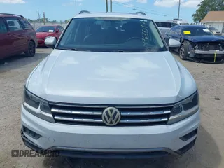 2018 Volkswagen Tiguan SEL with VIN 3VV3B7AX5JM053045, listed as a IAAI auction lot 41963017 with 77,495 mi miles and . Bid and sale history available at DreamBid. Image 12.