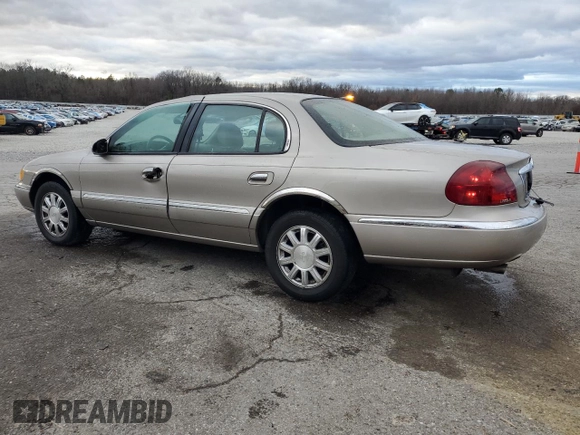 2001 Lincoln Continental z VIN 1LNHM97V41Y633841, wystawiony jako Copart lot #86695664 z przebiegiem 166 931 mil mil oraz Szkoda całkowita • Salvage title. Historia ofert i sprzedaży dostępna na DreamBid. Obrazek 2.