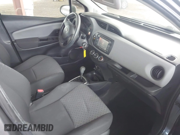 2015 Toyota Yaris L with VIN VNKKTUD36FA032392, listed as a IAAI auction lot 41727506 with 72,261 mi miles and . Bid and sale history available at DreamBid. Image 5.