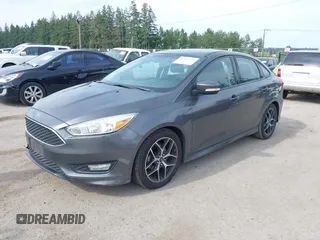 2015 Ford Focus SE with VIN 1FADP3F20FL269846, listed as a IAAI auction lot 42507197 with 143,496 mi miles and . Bid and sale history available at DreamBid. Image 2.