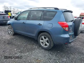 2006 Toyota RAV4 with VIN JTMBK33VX65003043, listed as a IAAI auction lot 42009844 with 294,380 mi miles. Bid and sale history available at carsss.com. Image 3.