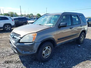 2002 Honda CR-V LX z VIN JHLRD78402C068542, wystawiony jako IAAI lot #42265409 z przebiegiem 205 650 mil mil oraz . Historia ofert i sprzedaży dostępna na DreamBid. Obrazek 17.