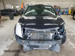 2016 Cadillac SRX Luxury Collection z VIN 3GYFNEE30GS583467, wystawiony jako Copart lot #57831135 z przebiegiem 139 890 mil mil oraz Szkoda całkowita • Salvage title. Historia ofert i sprzedaży dostępna na DreamBid. Obrazek 5.