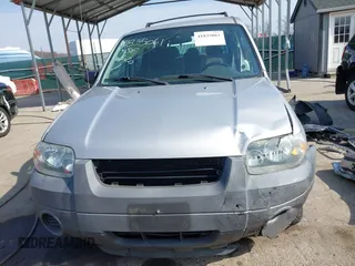 2005 Ford Escape XLS Value with VIN 1FMCU02Z15KA21718, listed as a IAAI auction lot 41835061 with 1 mi miles. Bid and sale history available at carsss.com. Image 13.