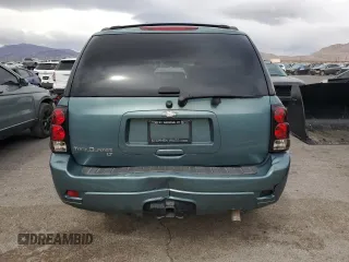 2009 Chevrolet TrailBlazer 1LT with VIN 1GNDS33S092130458, listed as a Copart auction lot 46877675 with 113,885 mi miles and Salvage Title. Bid and sale history available at DreamBid. Image 6.