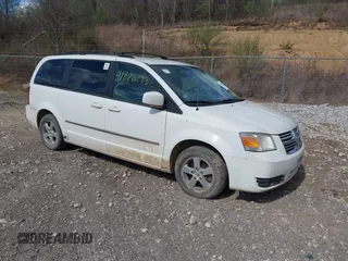 2010 Dodge Grand Caravan SXT with VIN 2D4RN5D12AR120322, listed as a IAAI auction lot 41876293 with Not Provided miles and . Bid and sale history available at DreamBid. Image 1.