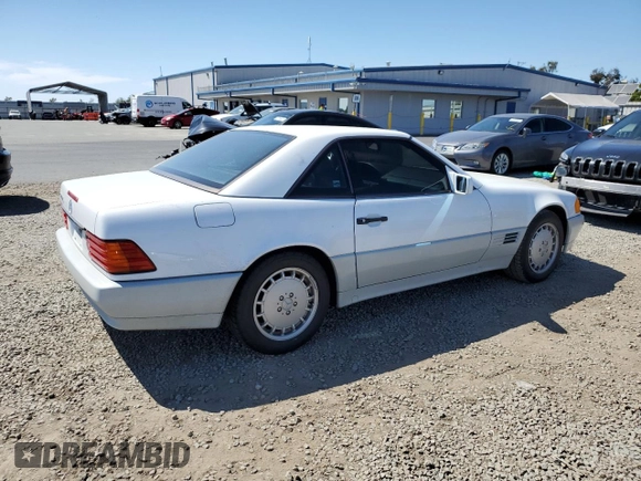 1992 Mercedes-Benz 500 z VIN WDBFA66E7NF049079, wystawiony jako Copart lot #52642285 z przebiegiem 69 976 mil mil oraz Szkody całkowita. Historia ofert i sprzedaży dostępna na DreamBid. Obrazek 3.