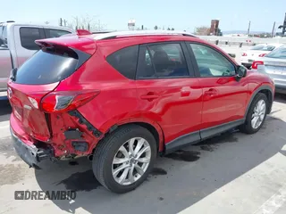 2015 Mazda CX-5 Grand Touring with VIN JM3KE2DY7F0537017, listed as a IAAI auction lot 41953011 with 78,098 mi miles. Bid and sale history available at carsss.com. Image 4.