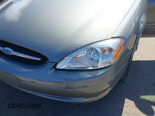 2002 Ford Taurus SES Standard with VIN 1FAFP55UX2G272540, listed as a IAAI auction lot 41874683 with 199,073 mi miles. Bid and sale history available at carsss.com. Image 6.