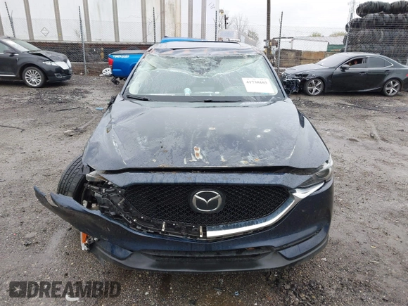 2019 Mazda CX-5 Grand Touring with VIN JM3KFBDM6K0592496, listed as a IAAI auction lot 41730103 with Not Provided miles and . Bid and sale history available at carsss.com. Image 11.