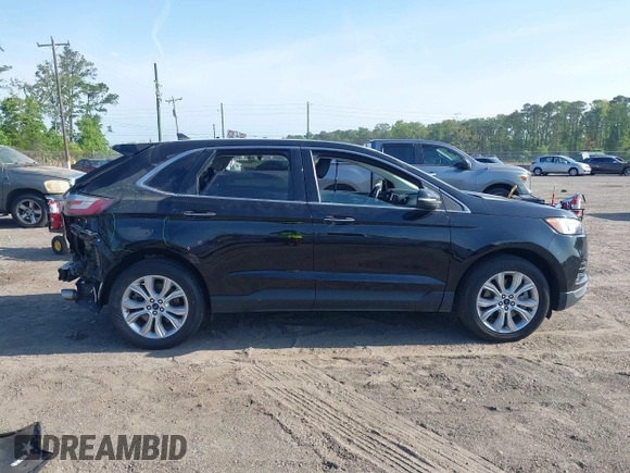 2022 Ford Edge Titanium with VIN 2FMPK4K99NBA45354, listed as a IAAI auction lot 42187761 with 75,458 mi miles and . Bid and sale history available at DreamBid. Image 13.