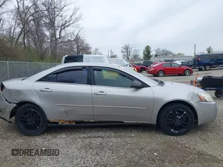 2006 Pontiac G6 6-Cyl z VIN 1G2ZG558064154096, wystawiony jako IAAI lot #41987316 z przebiegiem 221 130 mil mil oraz . Historia ofert i sprzedaży dostępna na DreamBid. Obrazek 14.