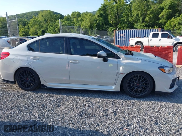 2015 Subaru WRX STI z VIN JF1VA2P65F9824661, wystawiony jako IAAI lot #42623315 z przebiegiem 69 103 mil mil oraz . Historia ofert i sprzedaży dostępna na DreamBid. Obrazek 13.