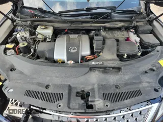 2020 Lexus RX 450h z VIN 2T2HGMDA7LC044429, wystawiony jako Copart lot #65892305 z przebiegiem 102 057 mil mil oraz Szkoda całkowita • Salvage title. Historia ofert i sprzedaży dostępna na DreamBid. Obrazek 11.