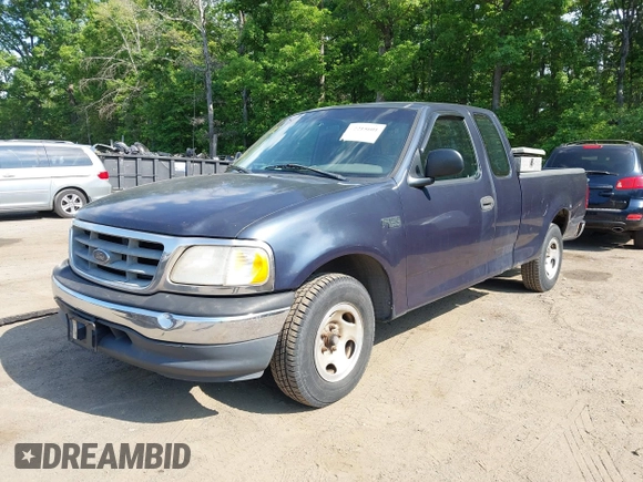 2000 Ford F-150 XL with VIN 1FTZX1723YNB00043, listed as a IAAI auction lot 42215601 with Not provided miles and . Bid and sale history available at DreamBid. Image 2.