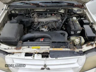 2002 Mitsubishi Montero Limited z VIN JA4MW51R52J027289, wystawiony jako Copart lot #71921024 z przebiegiem 199 334 mil mil oraz Tytuł czysty. Historia ofert i sprzedaży dostępna na DreamBid. Obrazek 12.