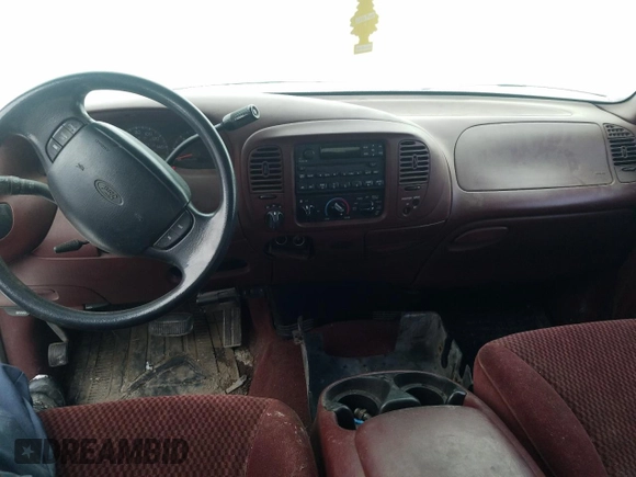 1998 Ford F-150 XL with VIN 2FTRX08L2WCA75995, listed as a Copart auction lot 43717305 with 301,987 mi miles and Salvage title. Bid and sale history available at DreamBid. Image 8.
